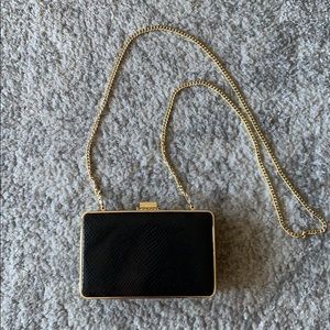 Michael Kors box clutch in black snake